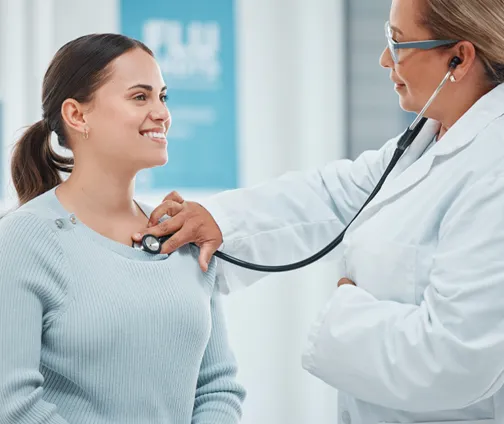 Patient and Doctor Examing her patient at Avalon Primary Care